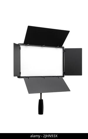 Photo and video lamp isolate on white background. LED lamp with special shutters for the formation of light flux. Photo and video lighting fixture. Stock Photo