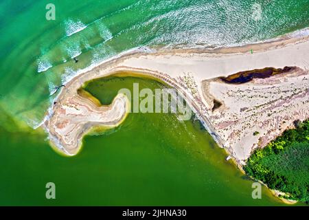 At the estuary of Pineios river. On the upper part, the Aegean Sea, on the lower part, the river. Larissa, Thessaly, Greece. Stock Photo