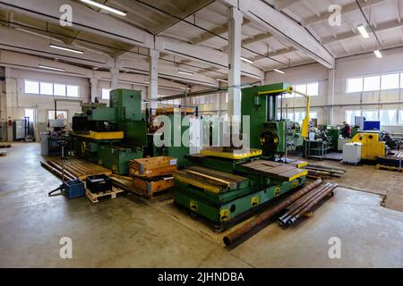 Industrial machine tools in metalworking workshop Stock Photo