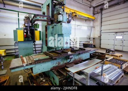 Industrial machine tools in metalworking workshop. Stock Photo