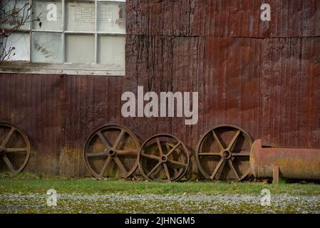 A rusted, corrugated tin wall of a farm outbuilding south of Christchurch, New Zealand Stock Photo