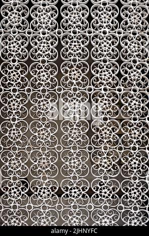 Ornate white window lattice closeup Stock Photo