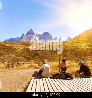 Resting tourists in National  Park Torres del Paine, Chile Stock Photo