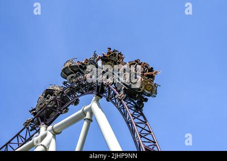 Thrill seekers on 'The Ride To Happiness', a large roller coaster at Plopsaland in Belgium. Stock Photo
