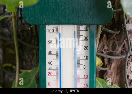 mercury thermometer reading nearly 40c 103f on a record breaking hot day in England Stock Photo