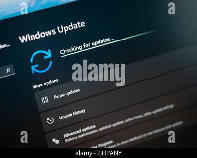 Galati, Romania - June 19, 2022: Checking for Windows 11 updates on laptop screen close up view Stock Photo
