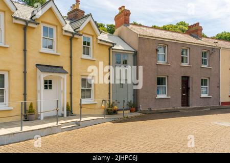 Fishguard Pembrokeshire Wales UK July 12 2022  lower fishing town harbor   row of cottages Tiny house Stock Photo