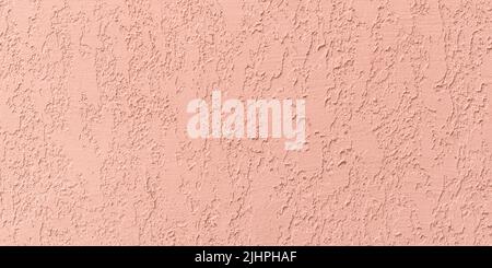 Coral stucco wall texture, peach color background. Abstract grunge artistic backdrop for design. Salmon color ribbed paper, pastel orange plaster, pat Stock Photo