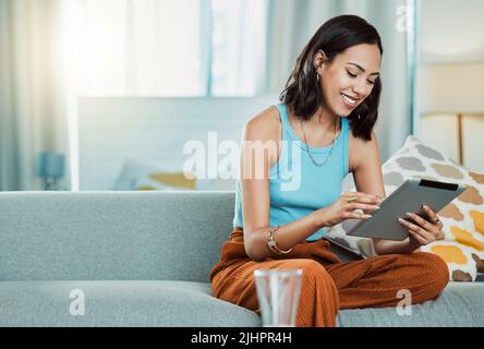 .. Stylish and elegant modern business woman working in an office or from home, while looking trendy, fashionable and edgy. Stock Photo