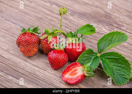 Fresh strawberries close-up on a wooden background Stock Photo