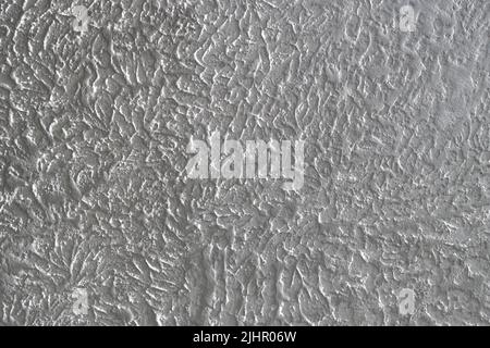 The grainy texture of wall plaster. Stock Photo