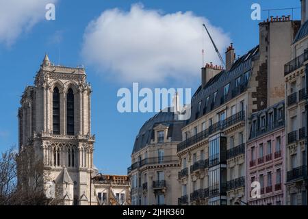 France, Ile de France region, Paris 5th arrondissement, rue de l'hotel Colbert, view on the towers of Notre Dame one year after the fire on the evening of 15 April 2019 Stock Photo