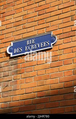 France, Region Grand Est, Marne, Reims, rue des Ecrevées, street sign, brick wall Stock Photo