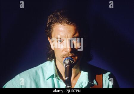 French singer-songwriter Francis Cabrel, on stage in 1986. Stock Photo