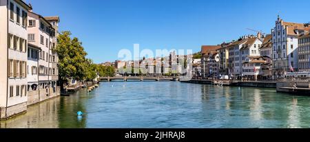 Poster view of Zurich with the Limmatquai promenade and the view down the river to the city of Zurich, Switzerland Stock Photo