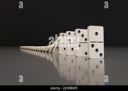 Domino pieces falling in chain reaction. 3D illustration. Stock Photo