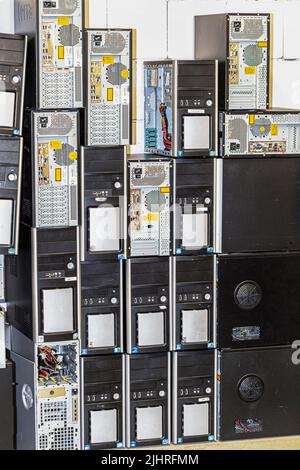 in a computer room there are many broken computers and e-waste for disposal Stock Photo