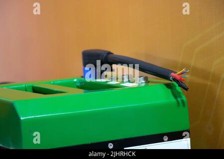 Electric vehicle battery with terminals for electronic control panels to send and receive electric power Stock Photo