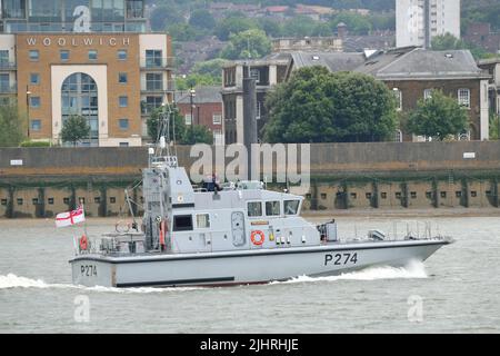 Royal Navy Archer-class inshore patrol boat HMS Tracker, P274, heading up the River Thames on a rare visit to London Stock Photo