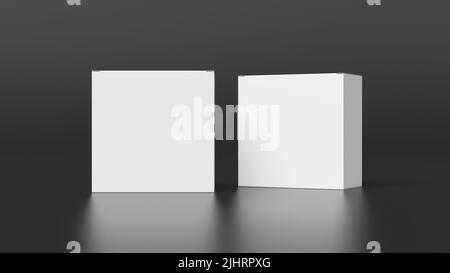 Two square boxes mock up. White gift boxes on black background. Front view Stock Photo