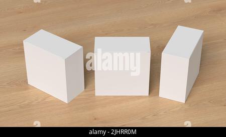 Three square boxes mock up. White gift boxes on wooden background. Front view Stock Photo