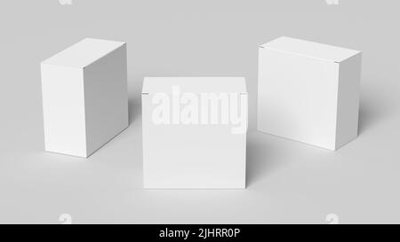 Three square boxes mock up. White gift boxes on white background. Front view Stock Photo