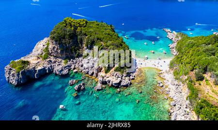 Corfu island best beaches, Greece . Aerial drone view of beautiful double beach with turquoise clear waters Limni beach Glyko near Paleokastritsa Stock Photo