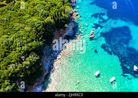 Corfu island, Greece . Aerial drone view of beautiful double beach with turquoise clear waters Limni beach Glyko near Paleokastritsa Stock Photo