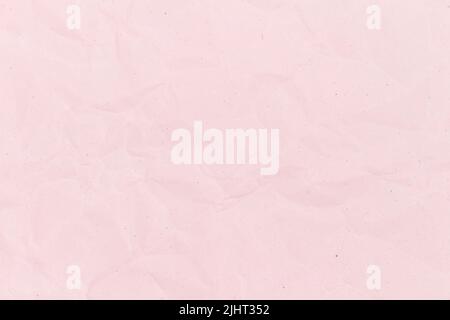 pink crumpled paper texture background. Stock Photo
