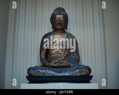 A decorative, ornamental glass head representation of Buddha, the  spiritualist leader of the Buddhist philosophy Stock Photo - Alamy