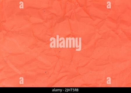 orange crumpled paper texture background. Stock Photo