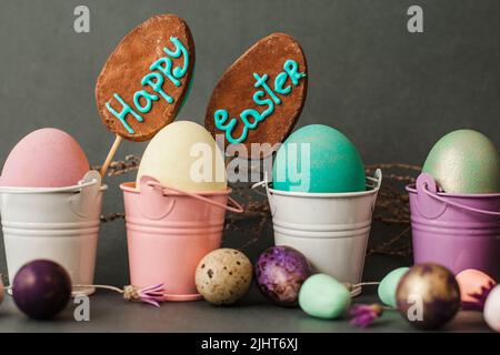 Color eggs in buckets. Happy easter background. Stock Photo