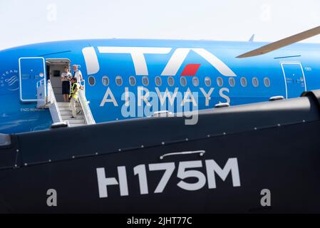 ITA Airways Airbus A350 behind Airbus Helicopters H175M at Farnborough International Airshow 2022. Stock Photo
