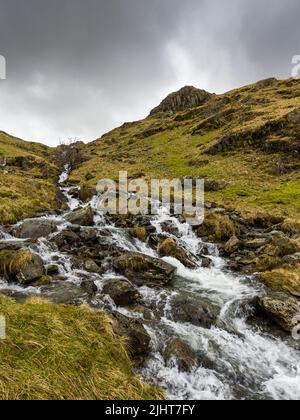 Small Water Beck waterfalls above Haweswater Reservoir in the Lake District National Park, Cumbria, England. Stock Photo