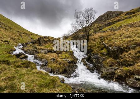 Small Water Beck waterfalls above Haweswater Reservoir in the Lake District National Park, Cumbria, England. Stock Photo