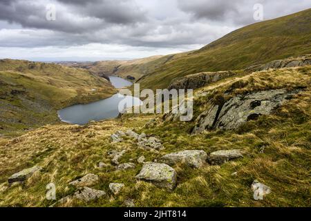 Small Water Tarn and Haweswater Reservoir from Nan Bield Pass below Harter Fell in the Lake District National Park, Cumbria, England. Stock Photo
