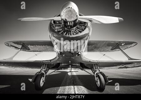 historical biplane on a runway ready for take off Stock Photo