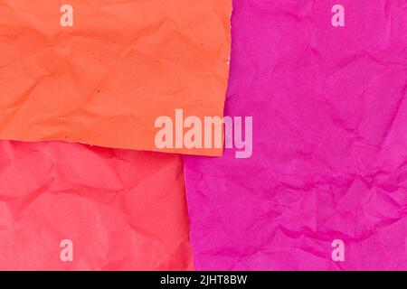 pink. orange. red. crumpled paper texture background. Stock Photo