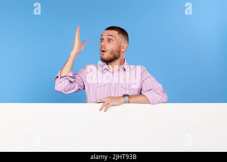cheerful man holding board with empty copy space Stock Photo