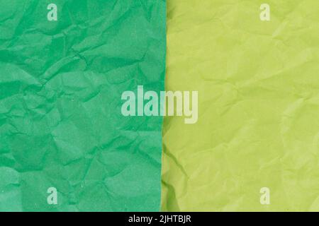 green and yellow crumpled paper texture background. Stock Photo