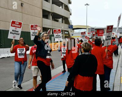 San Diego CA US July 20, 2022:  Hilton Bayfront Union 30 workers on strike picketing for better wages at the entrance to the hotel. Stock Photo