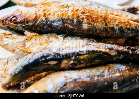 Asturian traditional food. Grilled sardines - Sardines barbecueing. Luanco, Gozón, Principality of Asturias, Spain, Europe Stock Photo