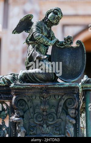 Angel sculpture detail. The bronze fence in front of Cappella Colleoni. Bergamo, Lombardy, Italy, Europe Stock Photo