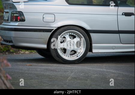 Lindesnes, Norway - October 15 2011: Rear right side of a silver BMW M3 E36 sports car. Stock Photo