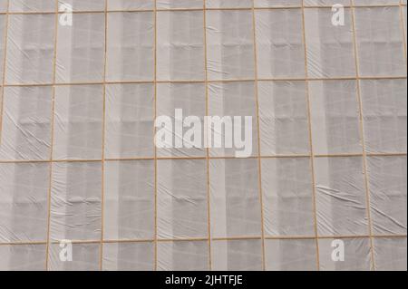 Oslo, Norway - July 22 2012: Boarded up windows at Regjeringskvartalet after the 2011 bombing. Stock Photo