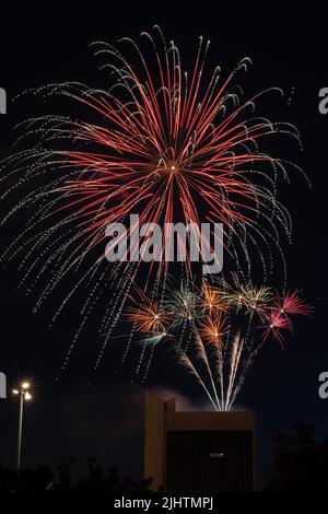 July 14 fireworks fired from a building Stock Photo