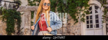 Young woman tourist in the old town of Budva. Travel to Montenegro concept BANNER, LONG FORMAT Stock Photo