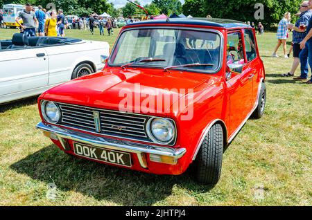 Front view of a 1971 Austin Mini in red at The Berkshire Motor Show in Reading, UK Stock Photo
