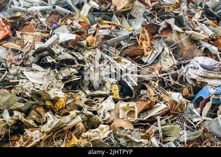 A large pile of household and industrial scrap metal at scrap metal purchasing company Stock Photo