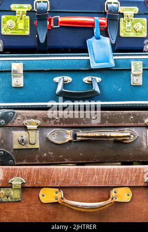 Stack of vintage retro suitcases Stock Photo